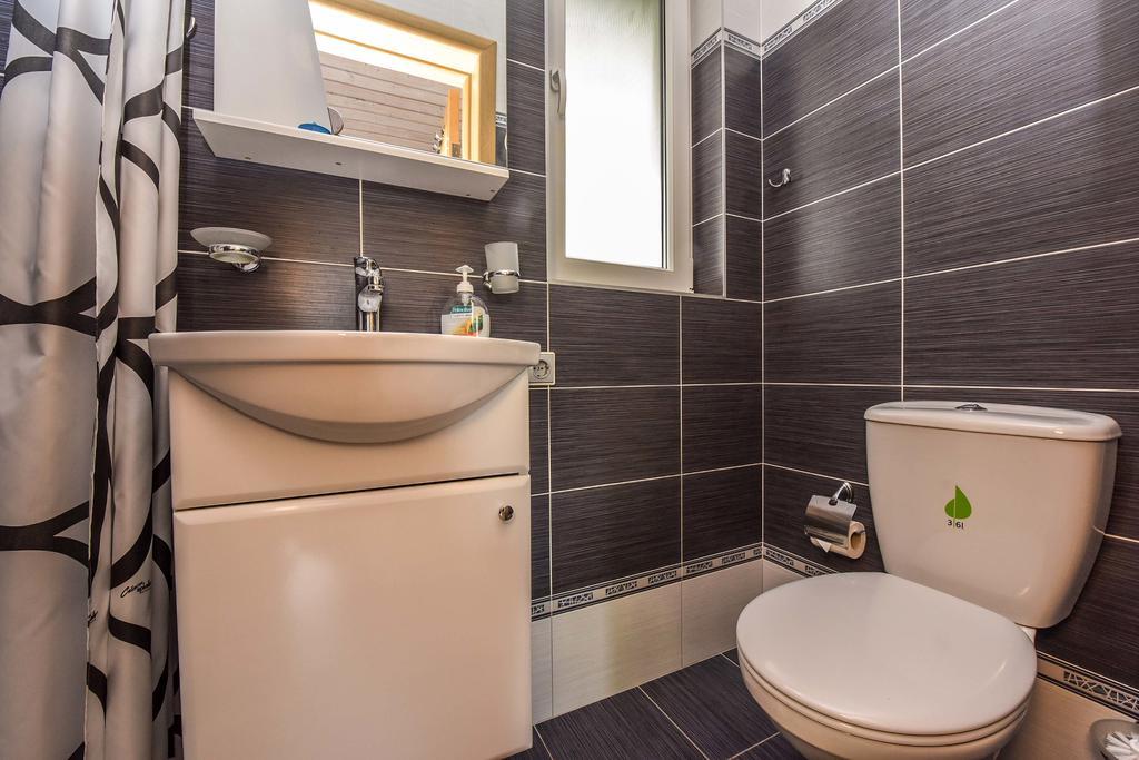 Apartamentai Trys Pusys Šventoji Esterno foto